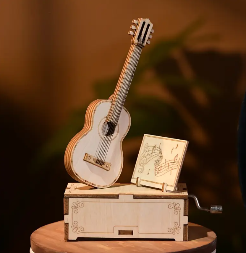 Kitarë Muzikore me Kuti Muzike