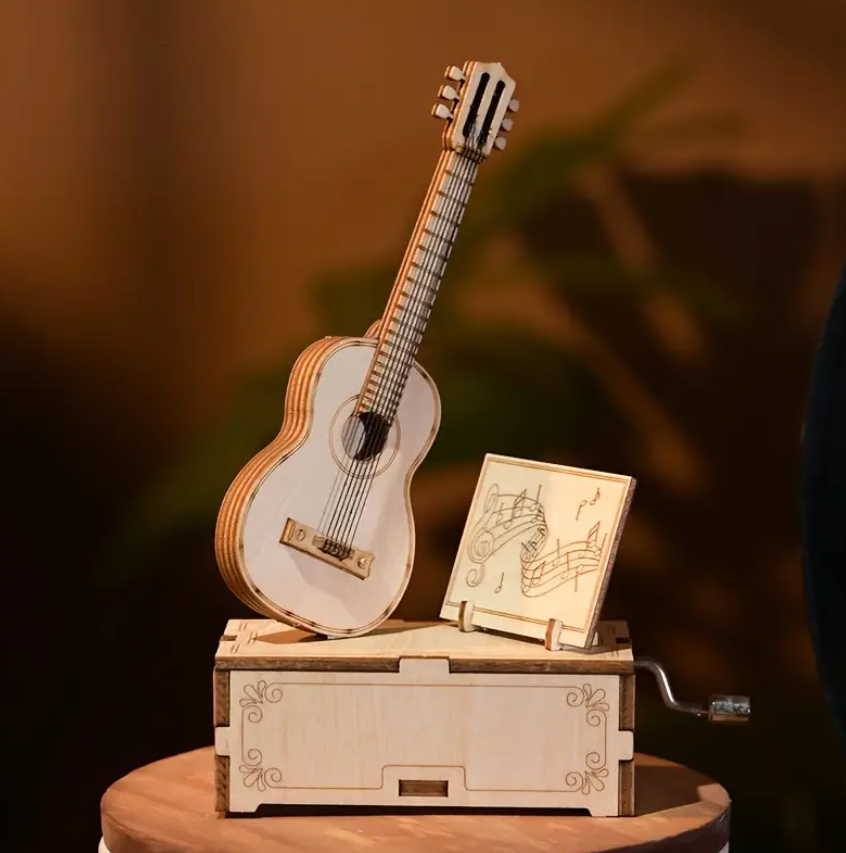 Kitarë Muzikore me Kuti Muzike